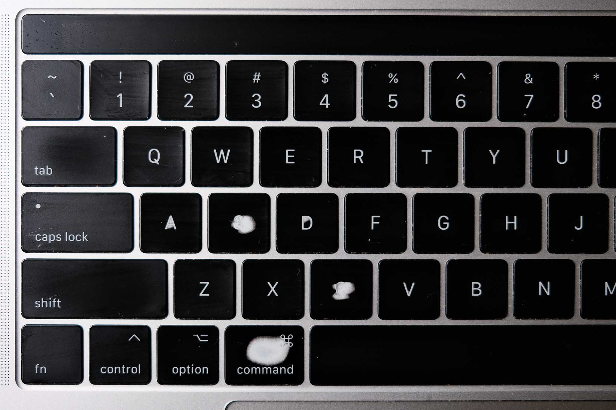 My old laptop keyboard with some worn down shortcut keys. Fuji X100V